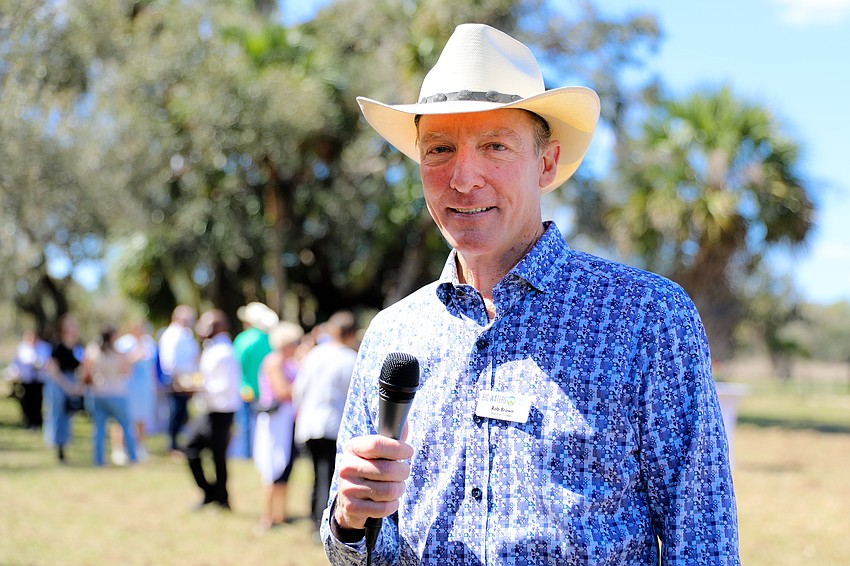Board member Rob Brown gives interviews from the event supporting Big Waters Land Trust.