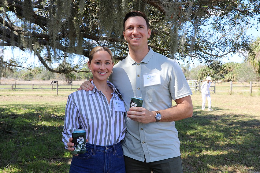 On a stroll to see the Walton Ranch cows are Alexis Pember and Matt Dunn.