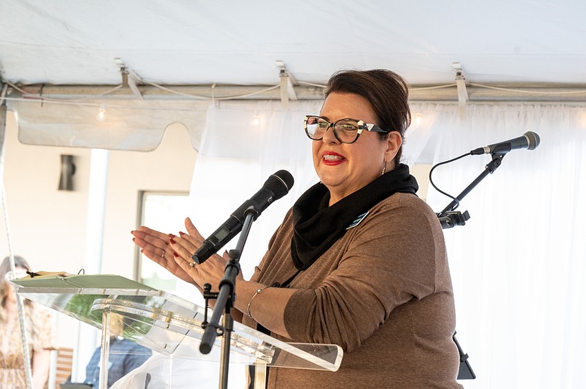 Resilient Retreat Executive Director Lisa Intagliata addresses the crowd.