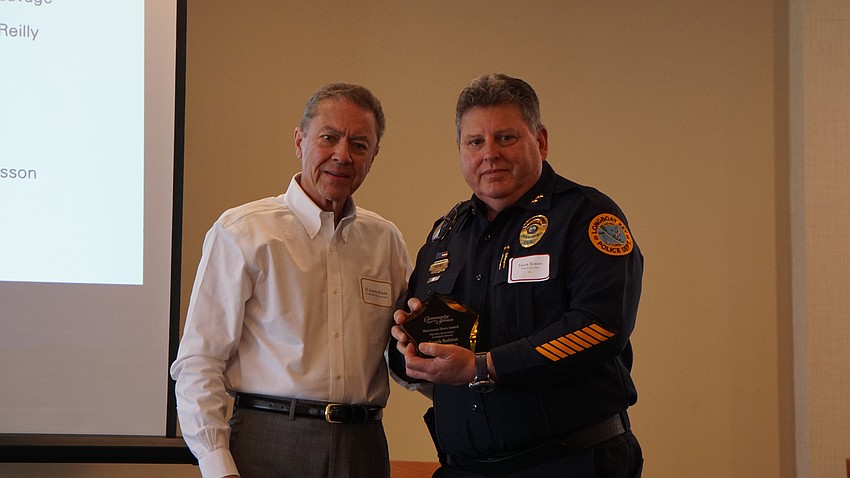H. Joseph Reiser and Interim Chief of Police Frank Rubino.