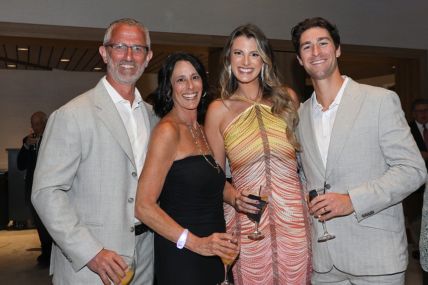 Andy and Debbie Peilet with Hallie and Jake Young