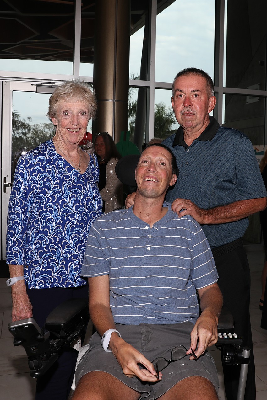 Lori and Brad Lilly with their son, Jeff.