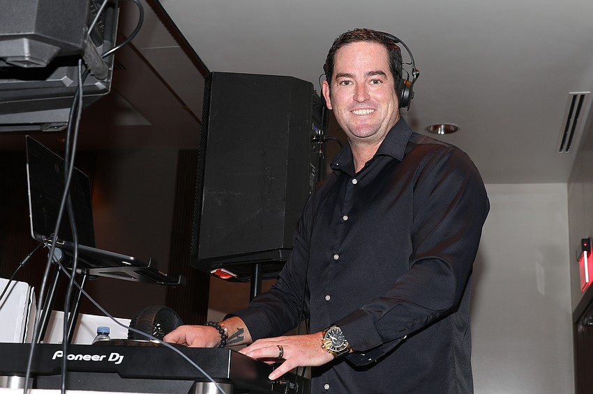DJ Dylan Gracie keeps the guests entertained.