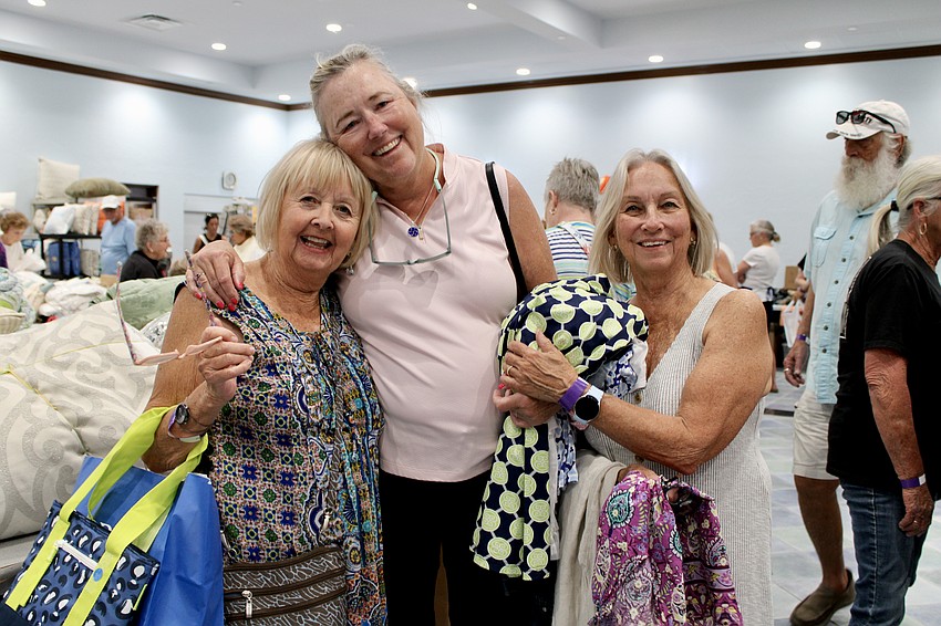 Pauline Kingsbury, Barbara Zaccone and Donna Gannon enjoy their annual tradition of meeting at the St. Mary, Star of the Sea, Catholic Church sale.