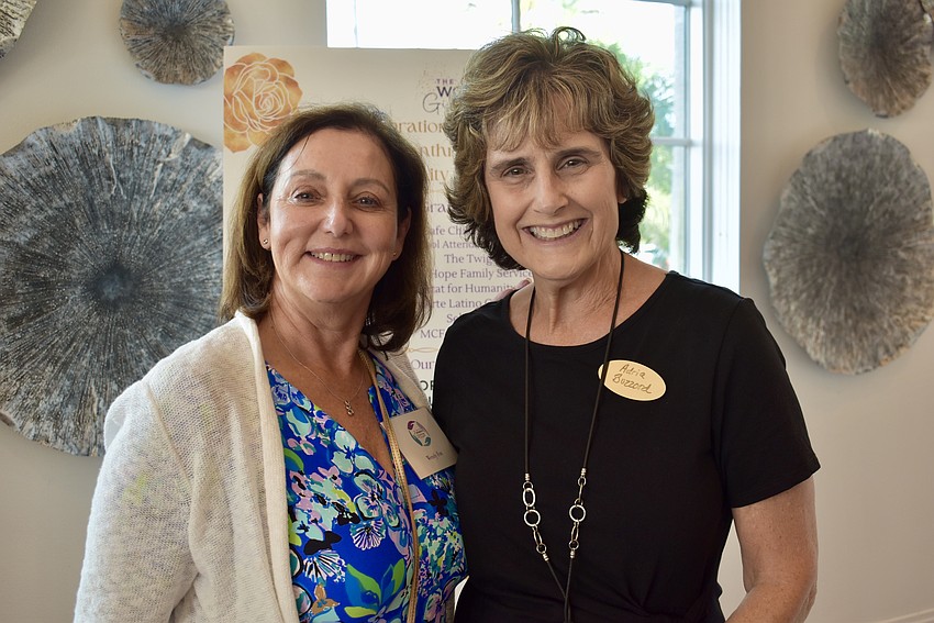 Wendy Fox and Adria Buzzard are neighbors. Buzzard is new to The Lake Club, so Fox is introducing her to the giving circle.