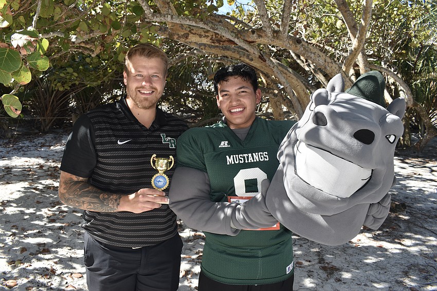 Lakewood Ranch High School Dean Brandon Ludwig accompanied senior Jayson Corpus, who played the Mustang, the winner of the race.