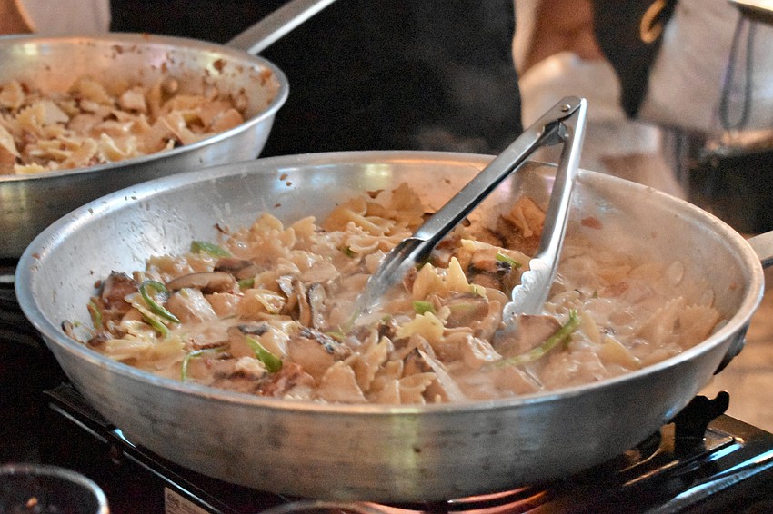 Guests cooked a pasta dish at the event.