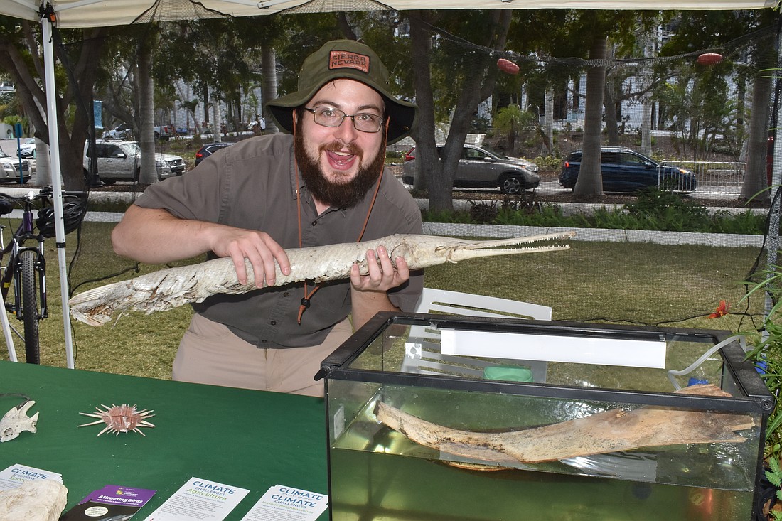 Sean Patton of Stocking Savvy holds a Florida gar specimen.
