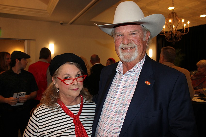 Lisa and John Barnott supported the Meals on Wheels Plus cause at Tropical Nights Under Paris Lights Saturday at the Grove.