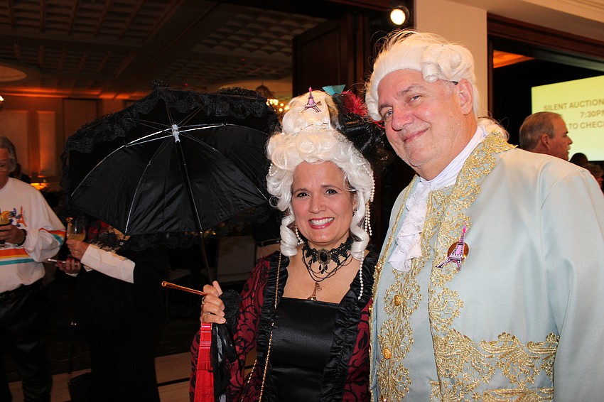 Yudelsy and Eric Epler of Sarasota bought their outfits for the 2024 Tropical Nights that had a pirate theme but felt that fit quite well for Under Paris Lights in 2025.