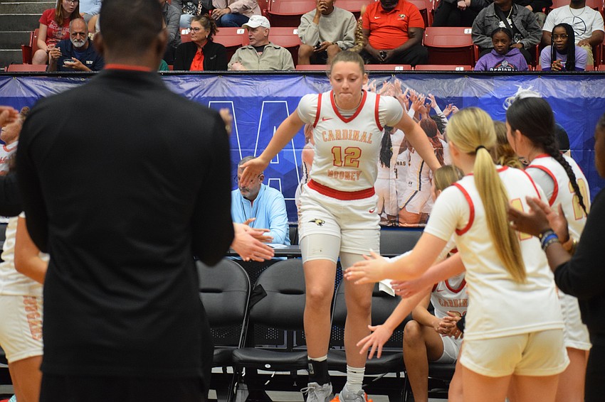Cardinal Mooney sophomore Madi Mignery jumps up as she's announced as a starter just ahead of the 3A state championship game against Bolles at RP Funding Center in Lakeland.