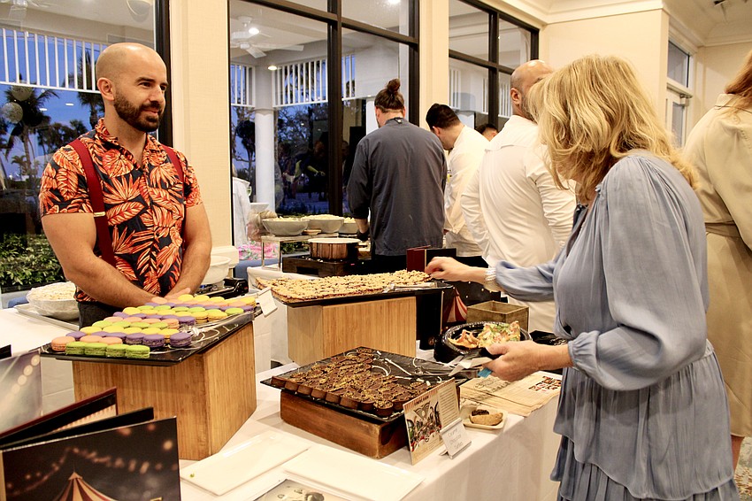 Paul Grothouse of Cirque St. Armands, a new luxury resort opening this month, dishes up sweets at Taste and Tunes of the Keys.