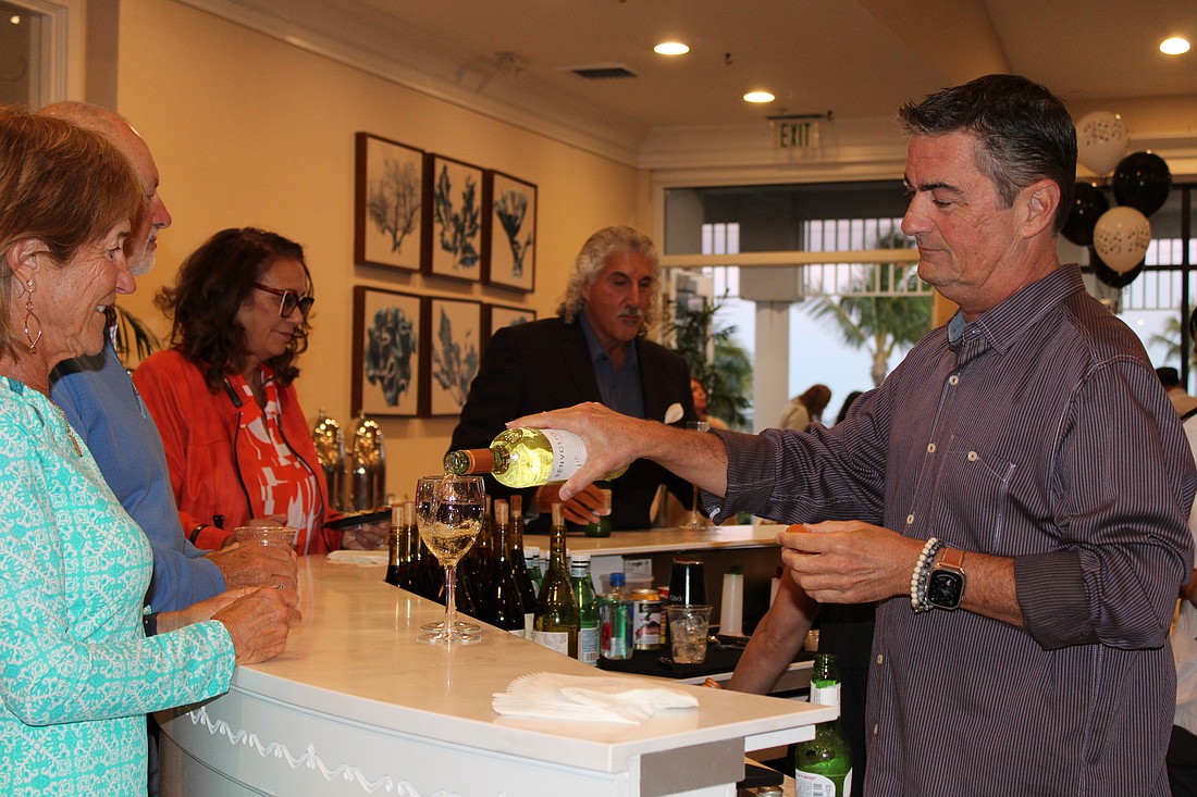 Bartender Sam Lastinger keeps the party going at Taste and Tunes of the Keys.