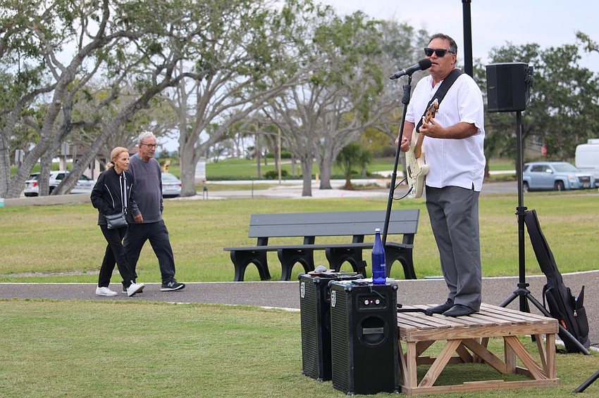 Opener Mike Sales welcomes concertgoers.