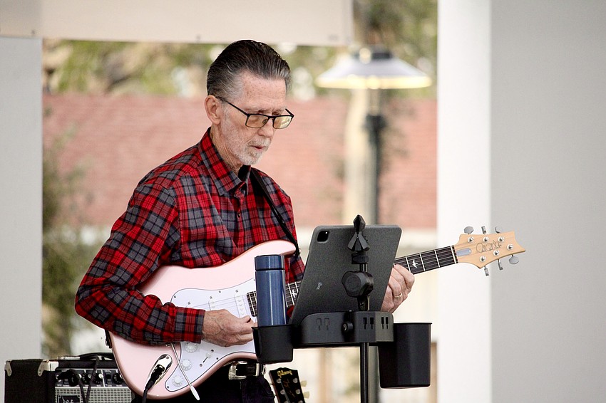 Danny Hoefer rocks out on the guitar.