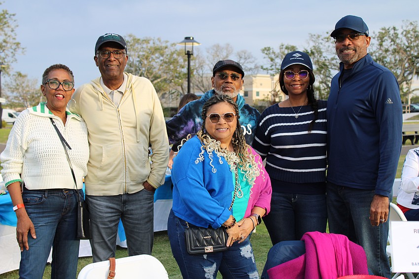 Pam and Andre Sampson, Stephenie and Mark Whitfield, and Regena and Rodney Perry take in the show.