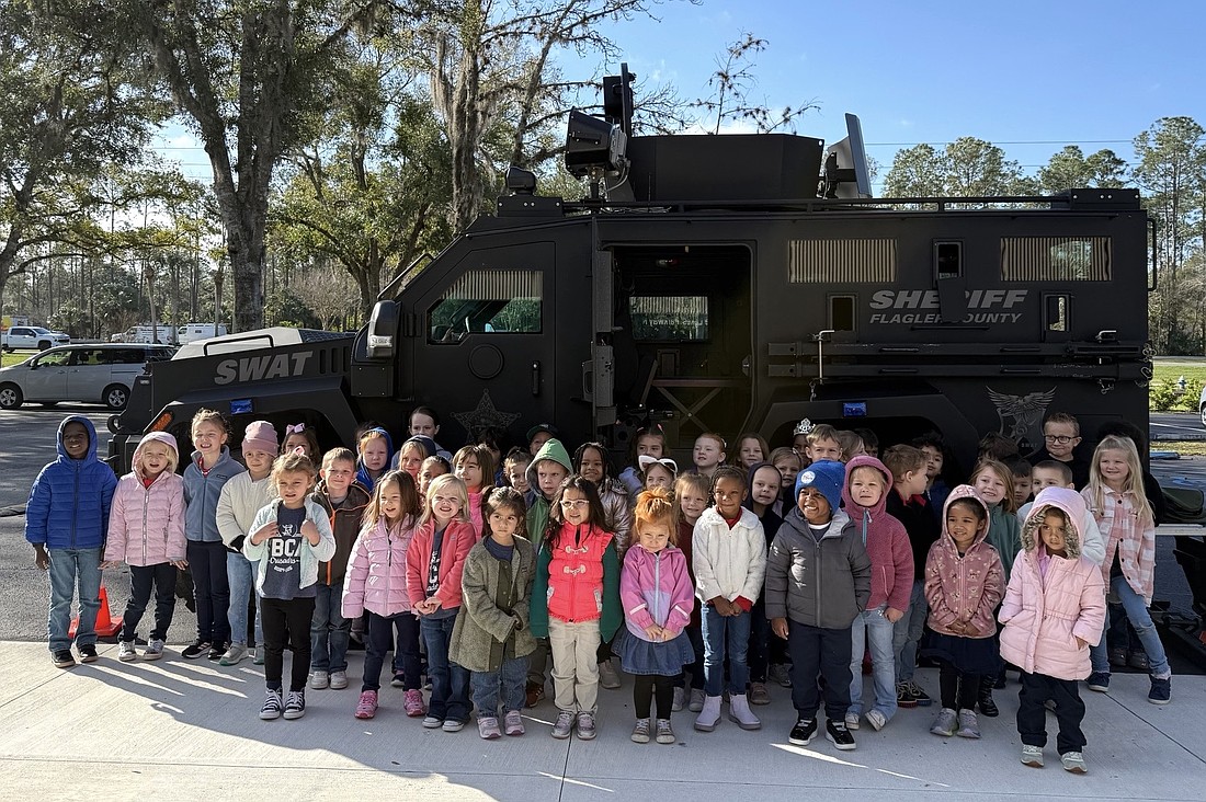 First Baptist Christian Academy preschoolers were treated to a visit from Flagler County Sheriff's Office SWAT team members. Courtesy photo