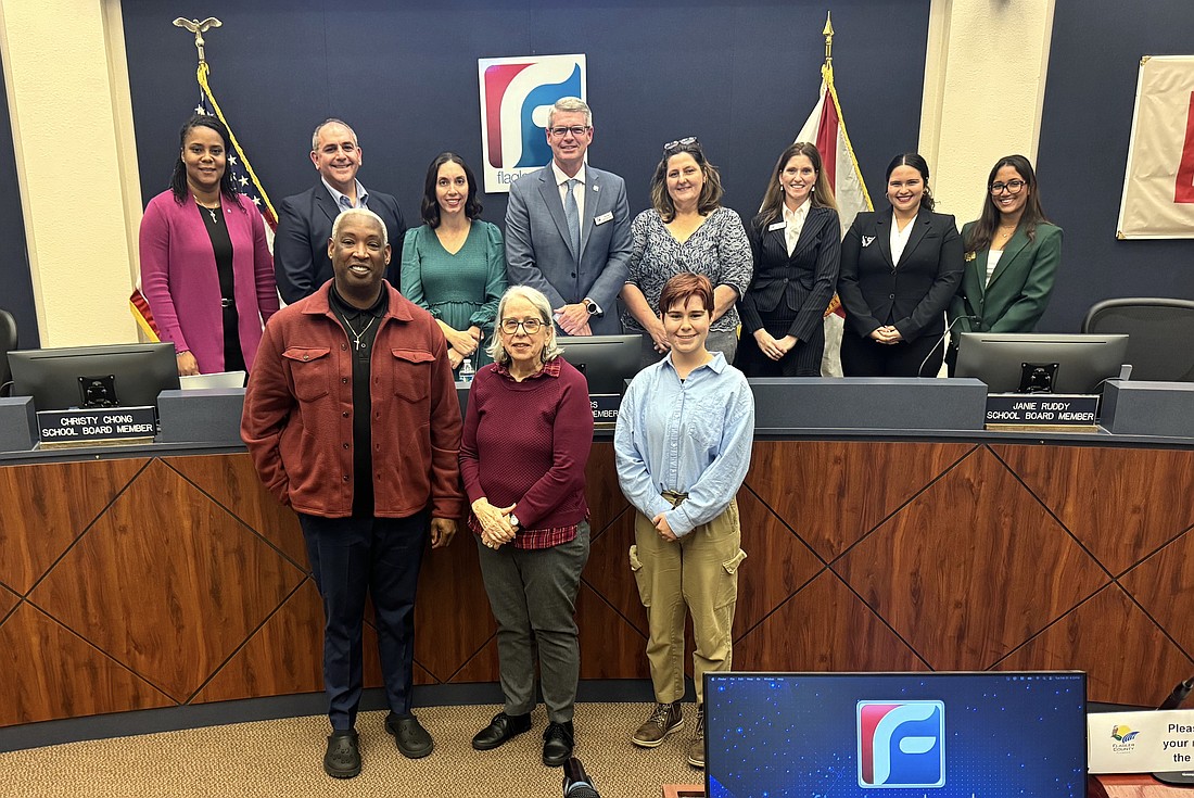 Stacy Smith, Mary Jo Woronoff and Violet Ochrietor won Outstanding School Volunteer awards at the Feb. 25 Flagler County School Board meeting. Courtesy photo/Flagler Schools