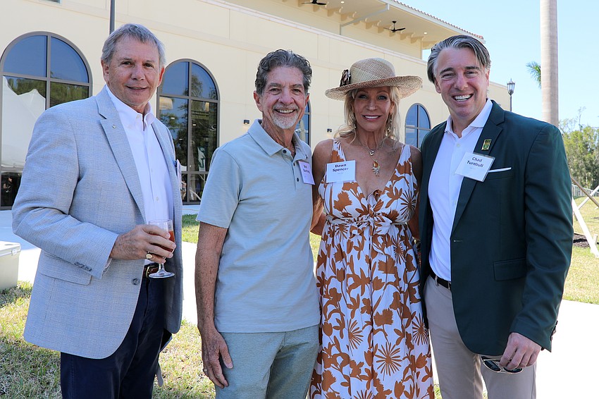 Bill Buckingham, Bob Bunting, Dawn Spencer and Chad Turnbull enter the 30th annual Brunch on the Bay held at USF's Sarasota-Manatee campus.