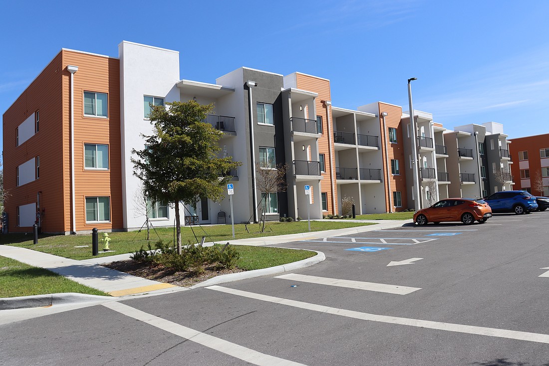 The first phase of Cypress Square apartments, legally Amaryllis Park Place Phase 2. Future phases of Cypress Square will replace The Courts.