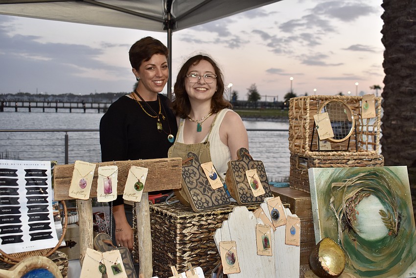 Driftheory founder Danielle Ferrantino and her Ringling student assistant Emma Butler man the shop's stand at Ranch Nite's night market.