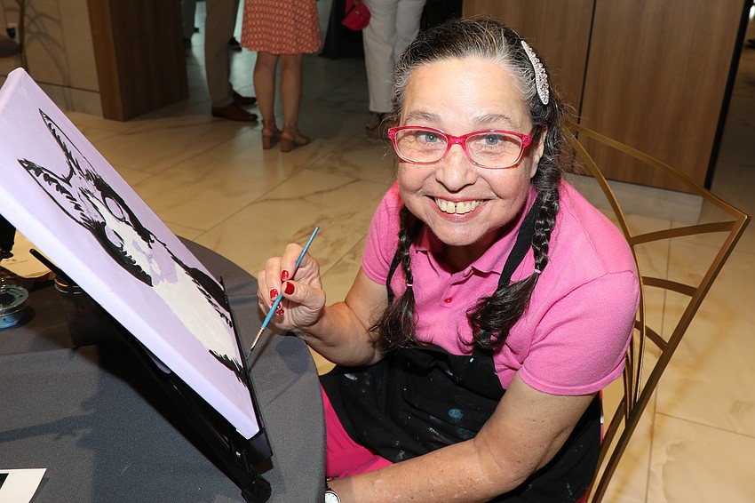 Breakout artist Anna Larussa loves to paint and takes part in the programs Easter Seals offers.
