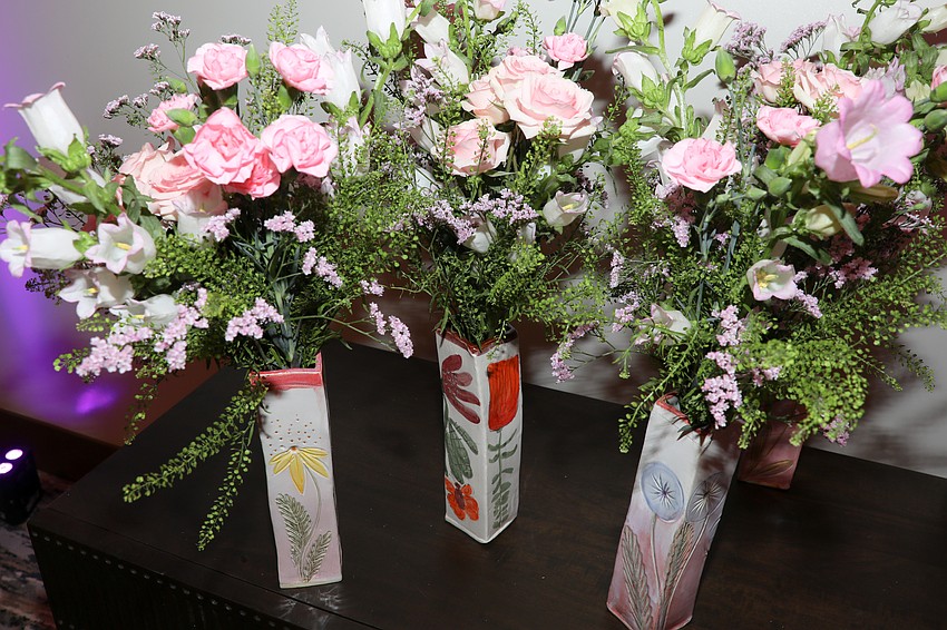 Program artists made the table vases for the Easter Seals Abilities Shining Luncheon held on March 5.