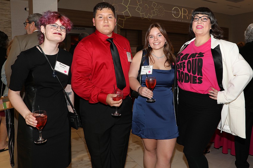 Volunteer peer educators from local high schools are Remus Hornsby, Vincent Mandujano and Braben Cressell-Simmons who are photographed with their Planned Parenthood educator, Kira-Lynn Ferderber.