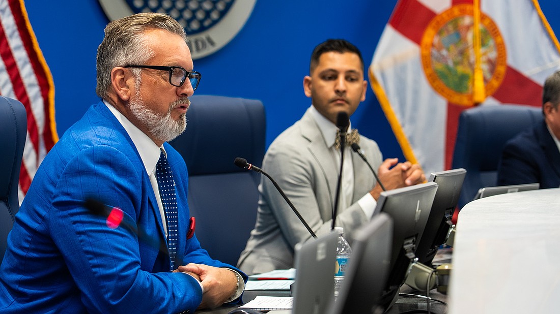 Commissioners Mike Rahn and Tal Siddique vote against terminating the contract with Red Speed.
