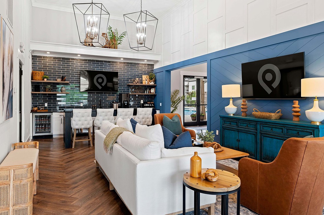 The clubhouse interior of Pointe Grand Plant City, a 300 unit multifamily housing complex.
