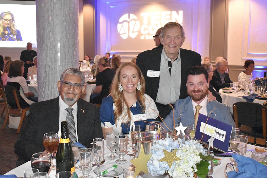 Teen Court board member John Colón, Emmalee Legler of Jon. F. Swift Construction, former Senator Mike Bennett and Legler's husband, 12th Judicial Circuit Court Judge Kennedy Legler.