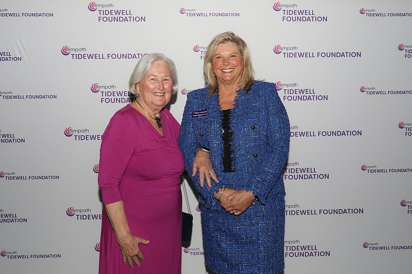 Tidewell Foundation Signature Luncheon founder Cindy Stuhley stops for a photo with foundation President Delesa Morris.