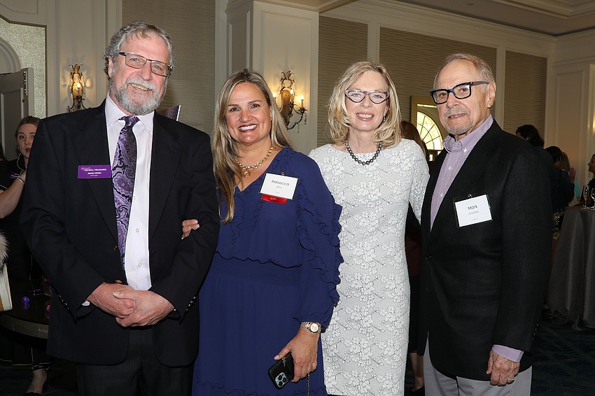 Tidewll Treasures manager Jamie White with Rebecca Blitz, Kathy Grogan and Mark Grebler