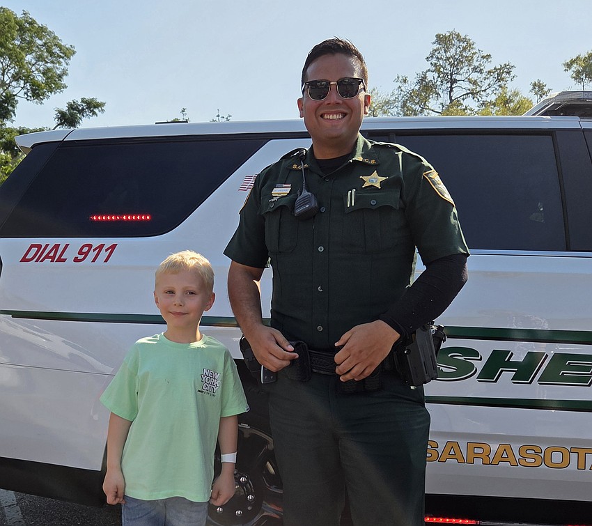 Emmett Walker got the opportunity to meet Deputy Burgos Aponte of the Sarasota Sheriff's Department on Sunday.