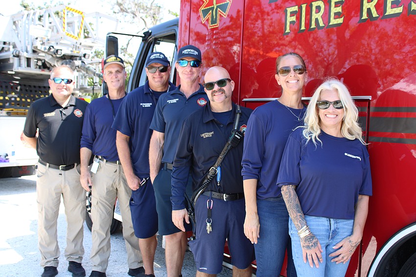 Tara Peta, Tina Adams, Brandon Desch, Denny Bickel, Brent Kruse, Chief Paul Dezzi and Asst. Chief Martin Szalbirak
