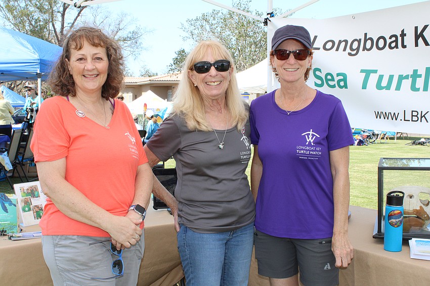 Carlyn Vigil, Suzy Mitchell and Karey Kaine welcome visitors to the Longboat Key Turtle Watch booth.