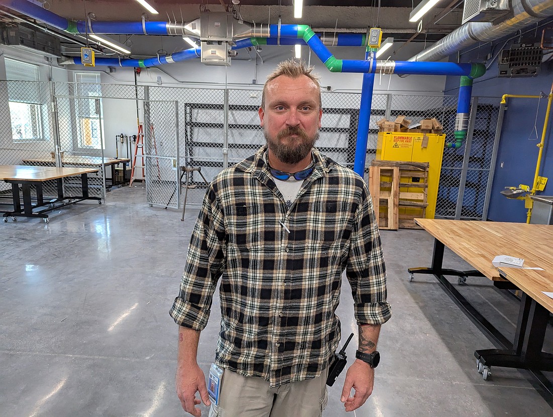 Building construction teacher Andy Douglas inside the new workshop room at Matanzas. Photo by Brent Woronoff