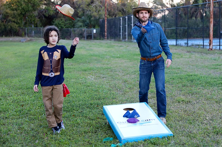 Austin B. plays a little cornhole with Joshua Payne.