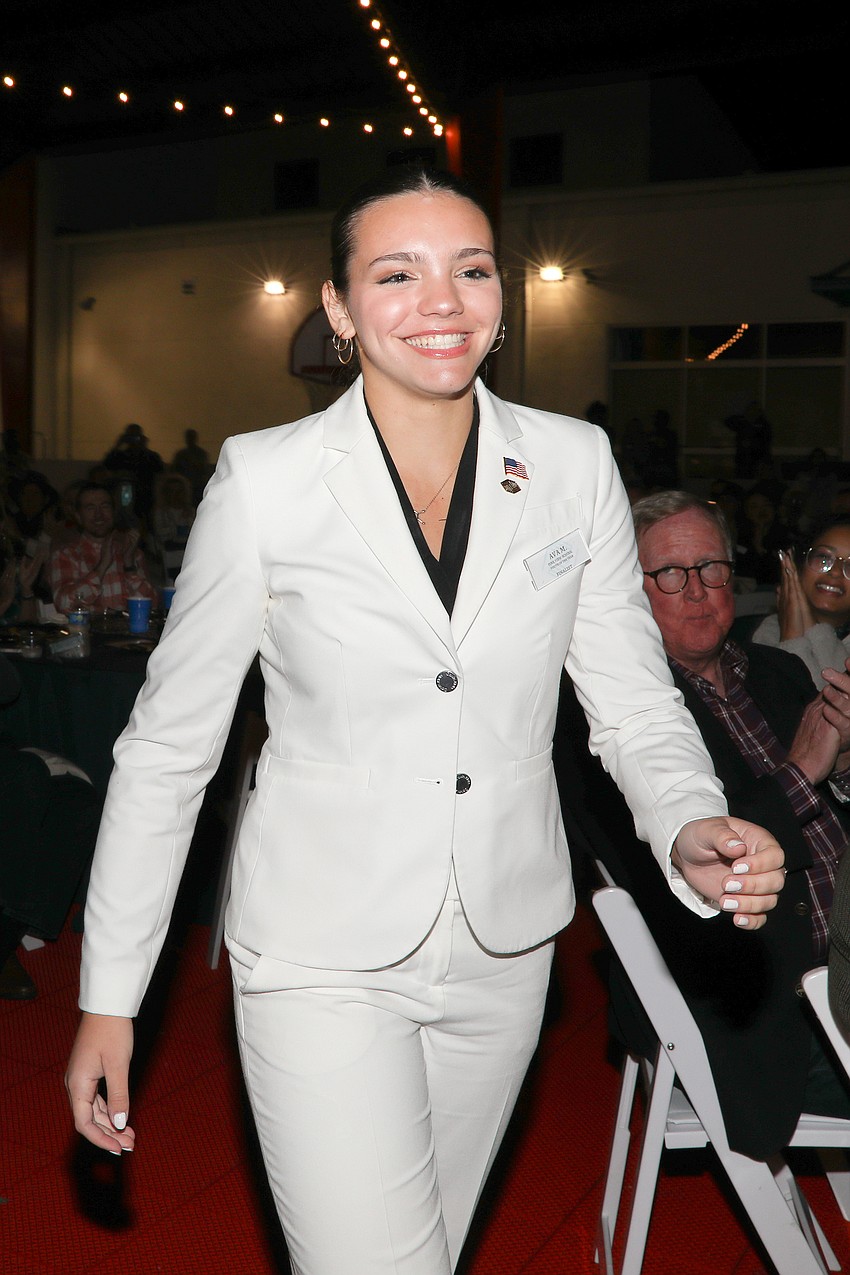 2025 Youth of the Year Ava M. makes her way to the podium.