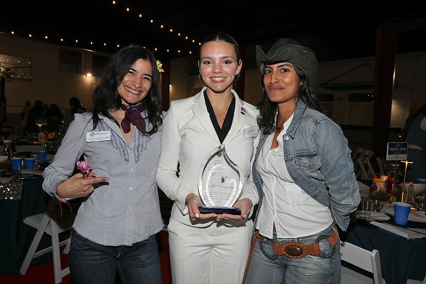 Leonela and Vanessa Tase Sueiro with the 2025 Youth of the Year, Ava M. (center)