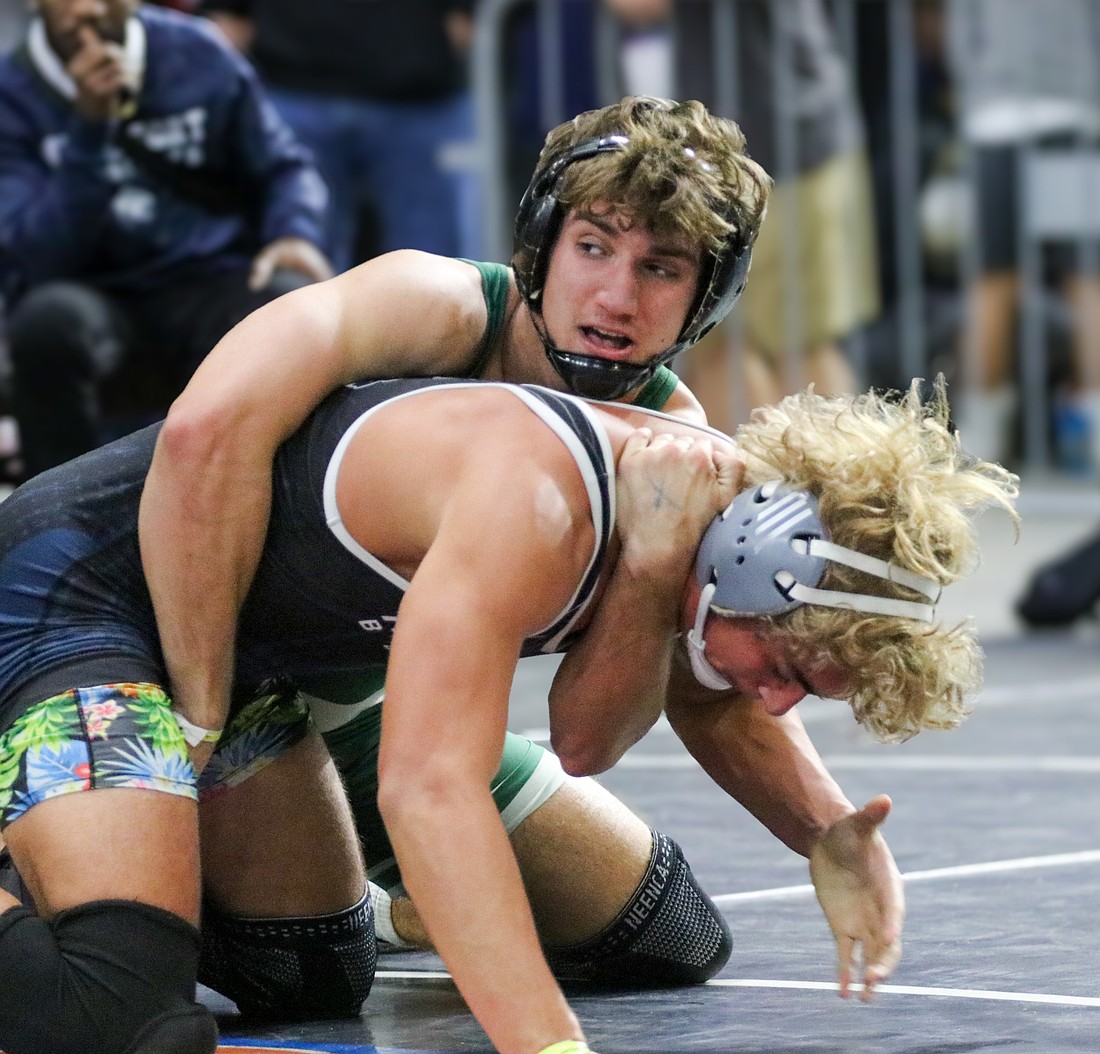 FPC's Carson Baert (top) placed fifth in the Class 3A 157-pound weight class at the 2025 state wrestling championships. Photo by Rachel and Abe Mills