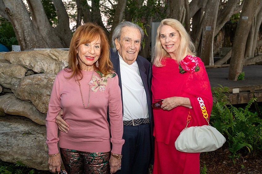 Event hosts Eileen and Howard Curd with Charlene Wolfe