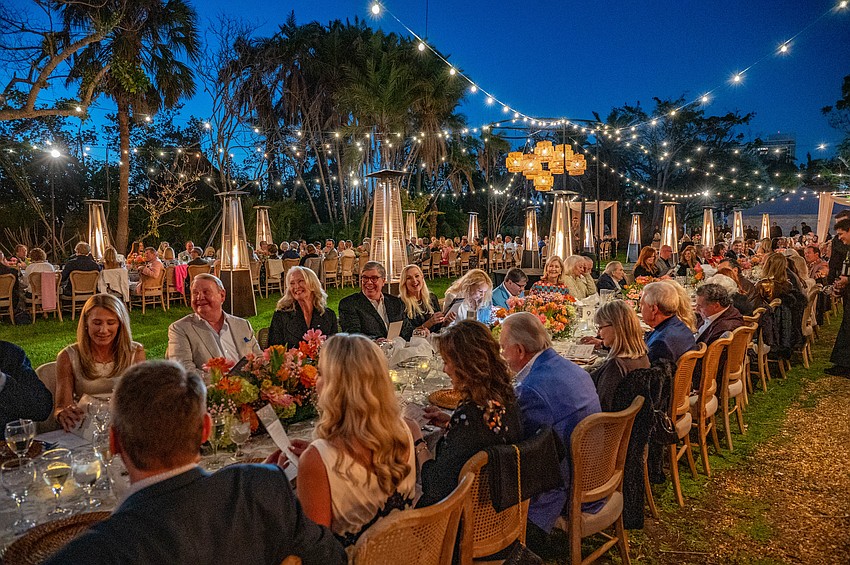 Guests prepare for the first course at Marie Selby Botanical Garden's Garden to Plate Wine Dinner.