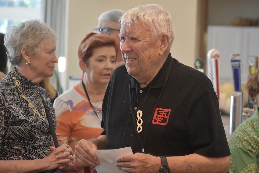 Keith Nelson earns an honorable mention for a painting that uses sumi-e ink, a Japanese black ink.