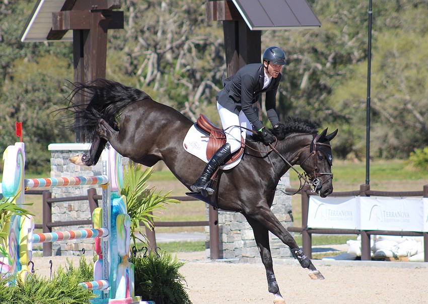J.Diago looks to have fallen out of the sky after cleaning a jump with Ireland's David Blake.