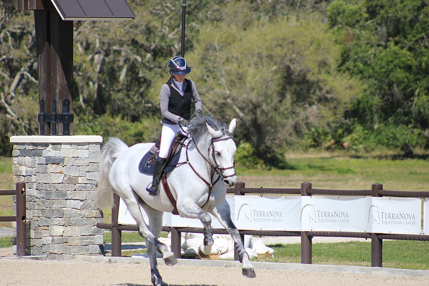 Fury does a little prancing during the run with Maggie Jacobs of the U.S.