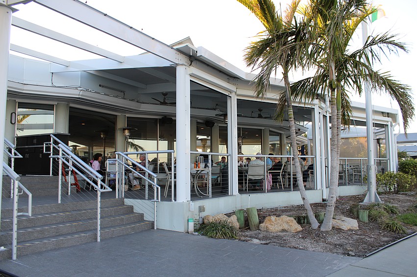 Vice Commodore Tony Britt pointed out that some storm damage, like the missing roof section, will remain until the building's impending demolition.