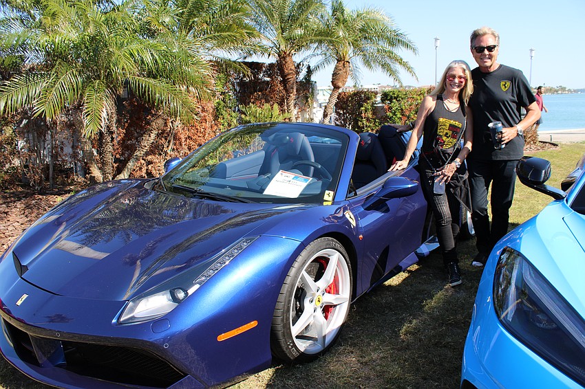 Renae and Geir Fjugstad exhibit their 2018 Ferrari 488 Spider.