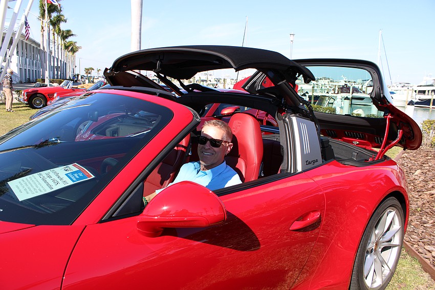 Johnathan Moore pops the top on his 2019 Porsche 911 Targa 4 GTS, which has a top speed of 195 mph.