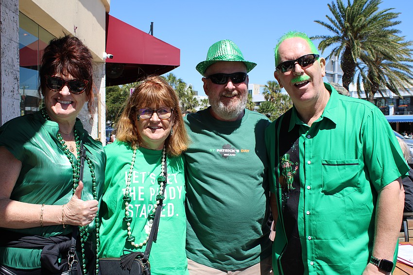 Jean Whelan, Bridget Moran, Eugene Cotter and Paul Whelan celebrate St. Patrick's Day on St. Armands Circle.